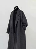 Double-Faced Wool Overcoat in Charcoal — still life