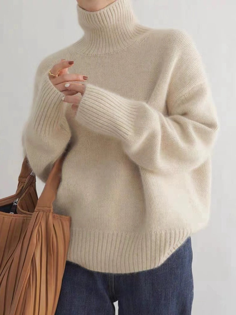Chunky Turtleneck Sweater in Cream — on model