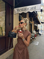 Cap-Sleeve Polka Dot Maxi Dress in Brown — on model