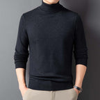 Wool-Blend Turtleneck Sweater in Charcoal — on model