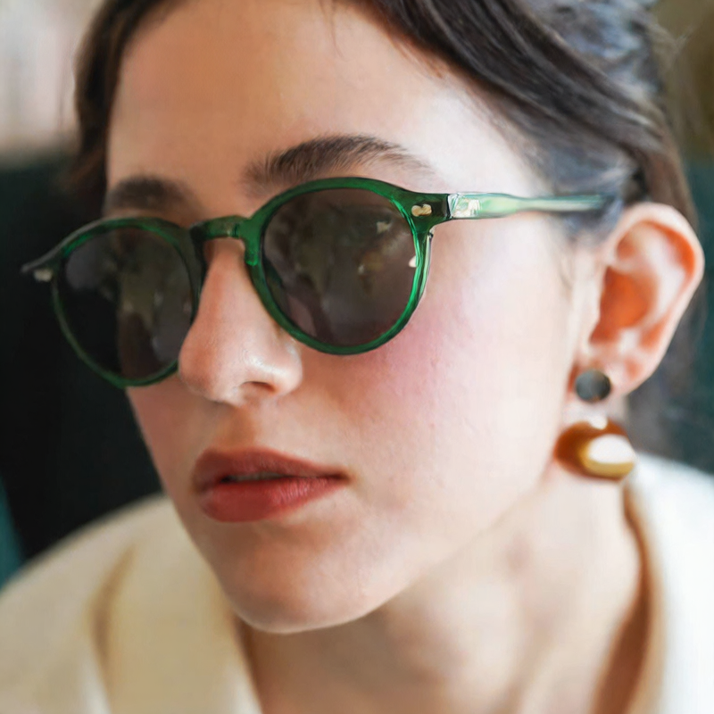 Classic Round Sunglasses in Forest Green — on model