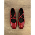 Crisscross Leather Mary Jane Flats in Red — flat lay