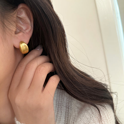 Brushed Gold Earrings in Gold — on model