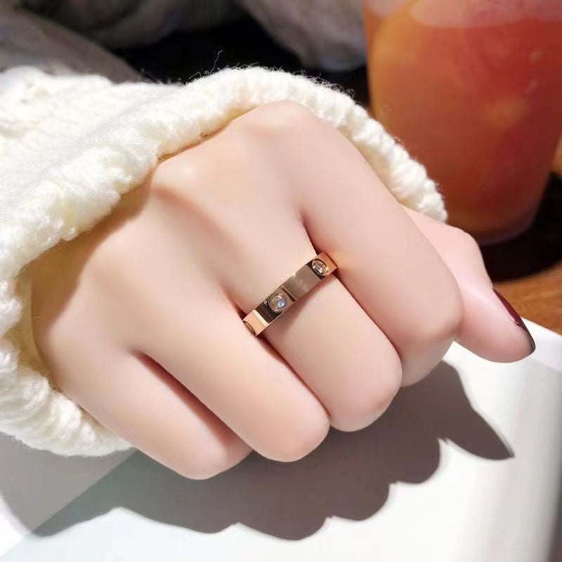 Crystal-Set Steel Ring in Rose Gold — on hand