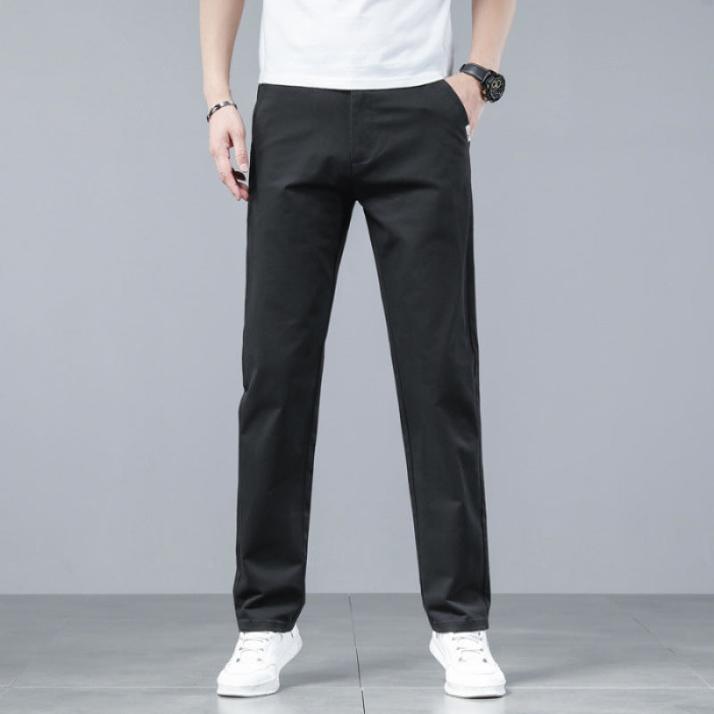 Straight-Leg Cotton Trousers in Black — on model