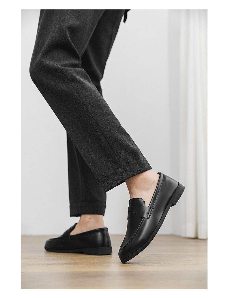 Two-Finish Penny Loafers in Black — on model
