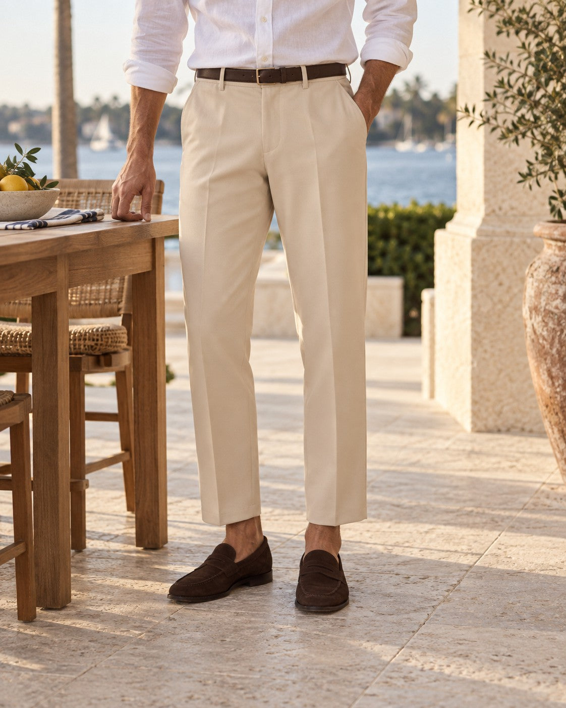 Cropped Pleated Trousers in Sand — on model