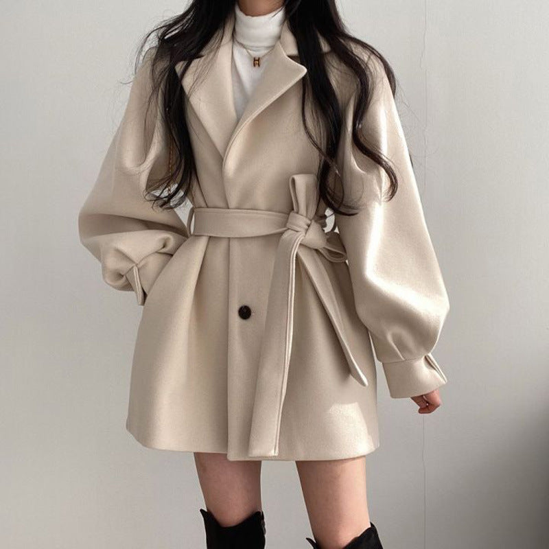 Belted Swing Coat in Ivory — on model