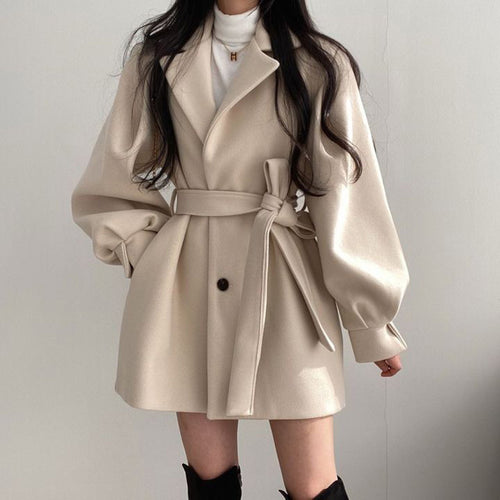 Belted Swing Coat in Ivory — on model