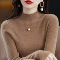 Seamless Wool-Blend Mock-Neck Sweater in Camel — on model