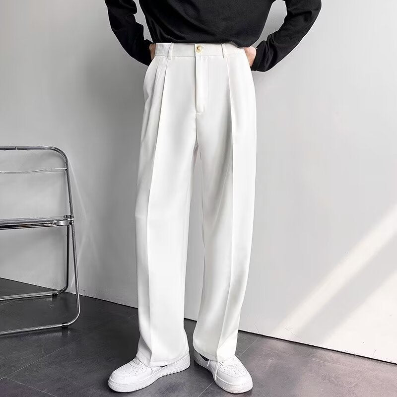 Wide-Leg Corduroy Trousers in White — on model