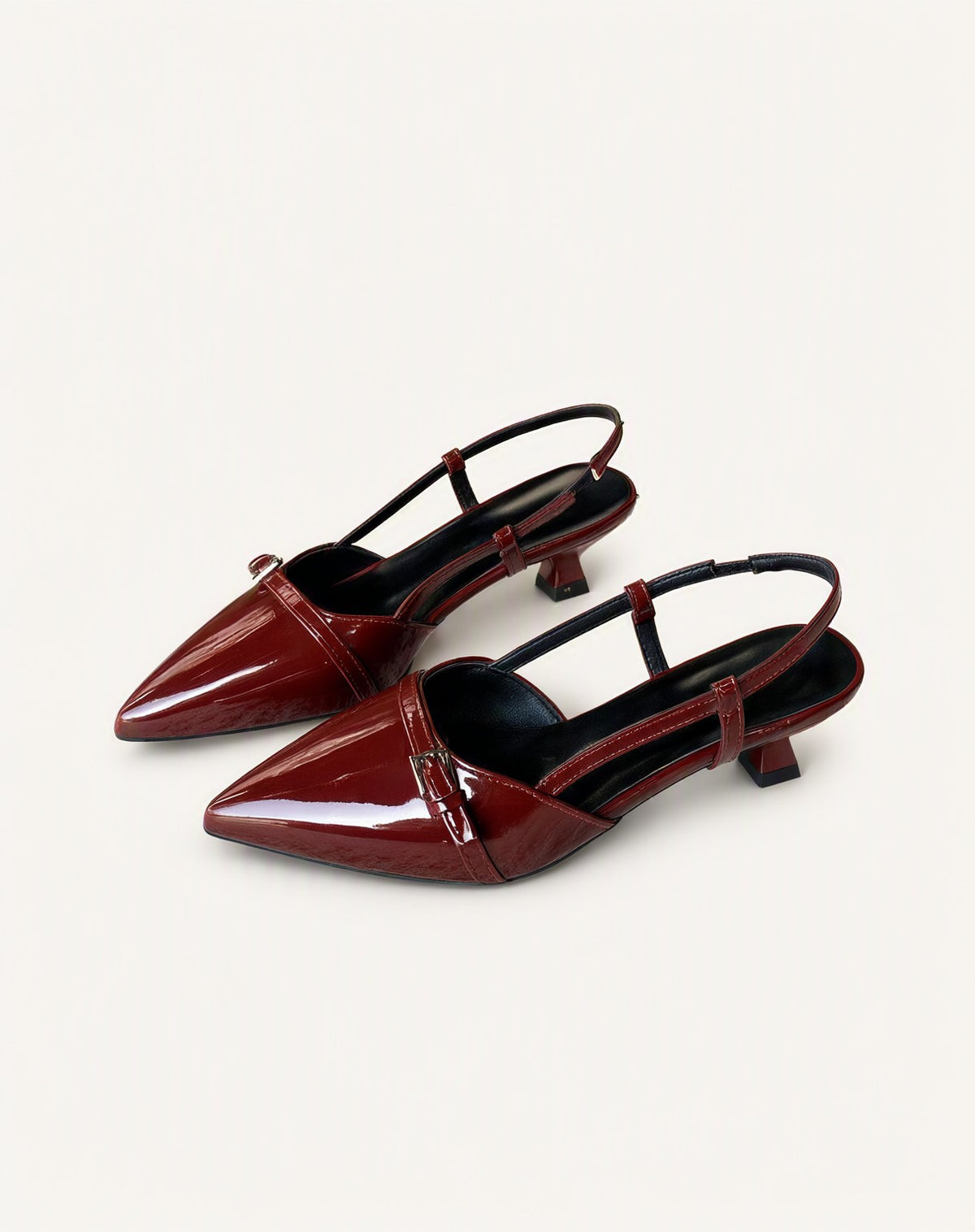 Buckle-Strap Slingback Kitten Heels in Burgundy — still life