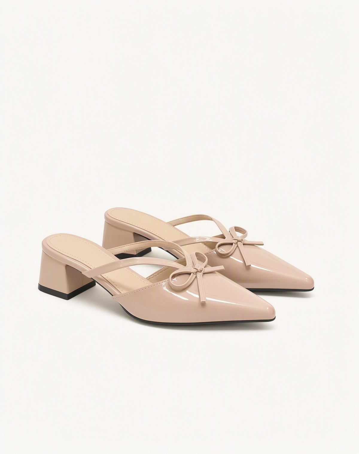 Bow-Strap Block-Heel Mules in Beige — still life