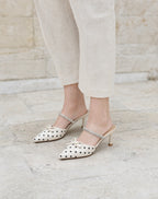 Polka-Dot Rhinestone-Strap Mules in Off-White/Black — on model
