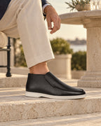 Suede Chukka Slip-Ons in Black — on model